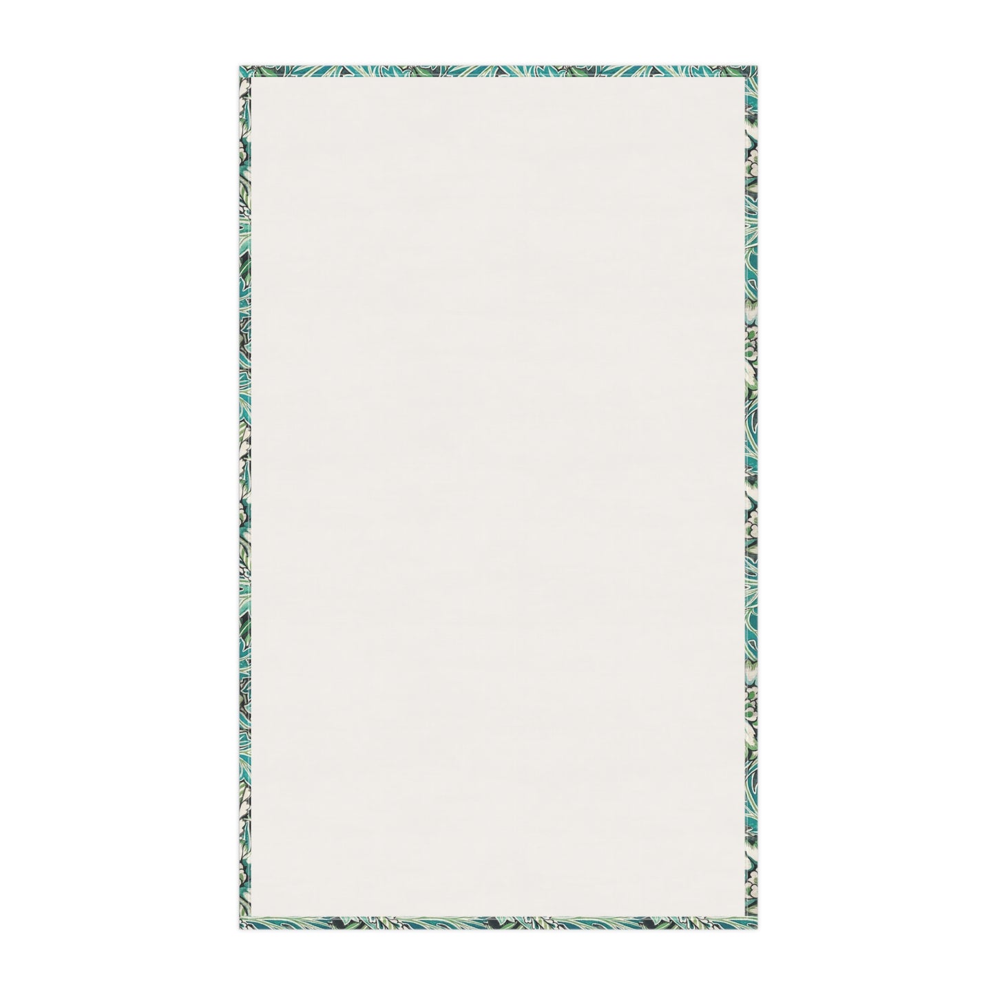 A kitchen tea towel with a floral pattern inspired by William Morris, in shades of blue, green, and white.