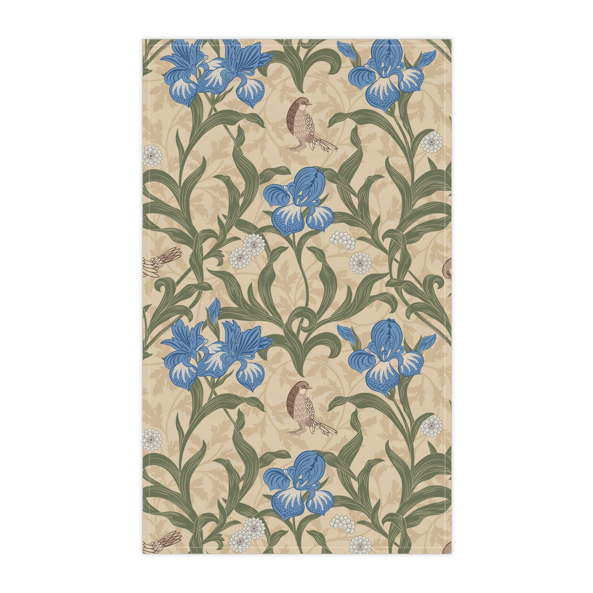 A kitchen tea towel with a William Morris & Co floral pattern featuring blue irises, birds, and a beige background.