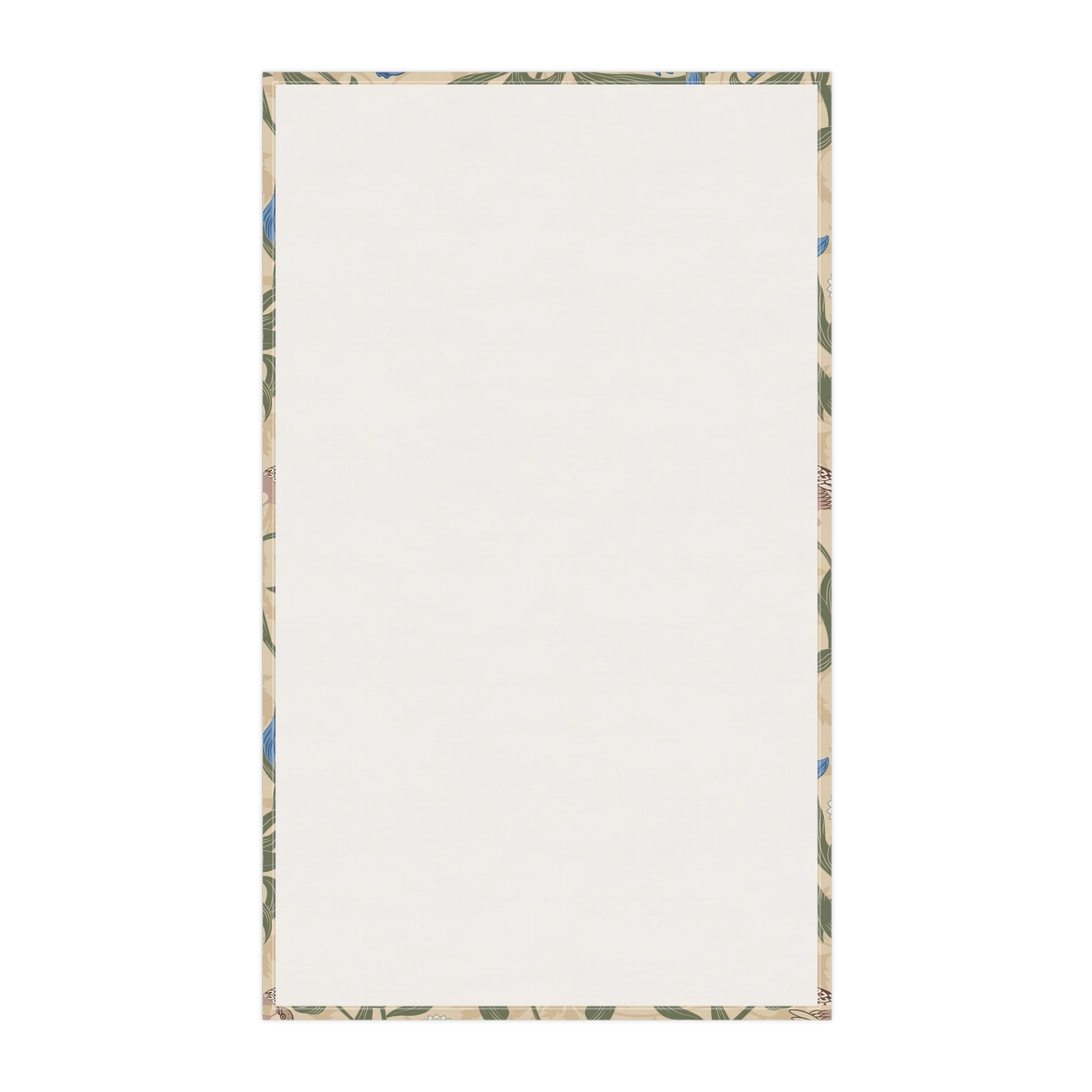 A kitchen tea towel with a William Morris & Co floral pattern featuring blue irises, birds, and a beige background.