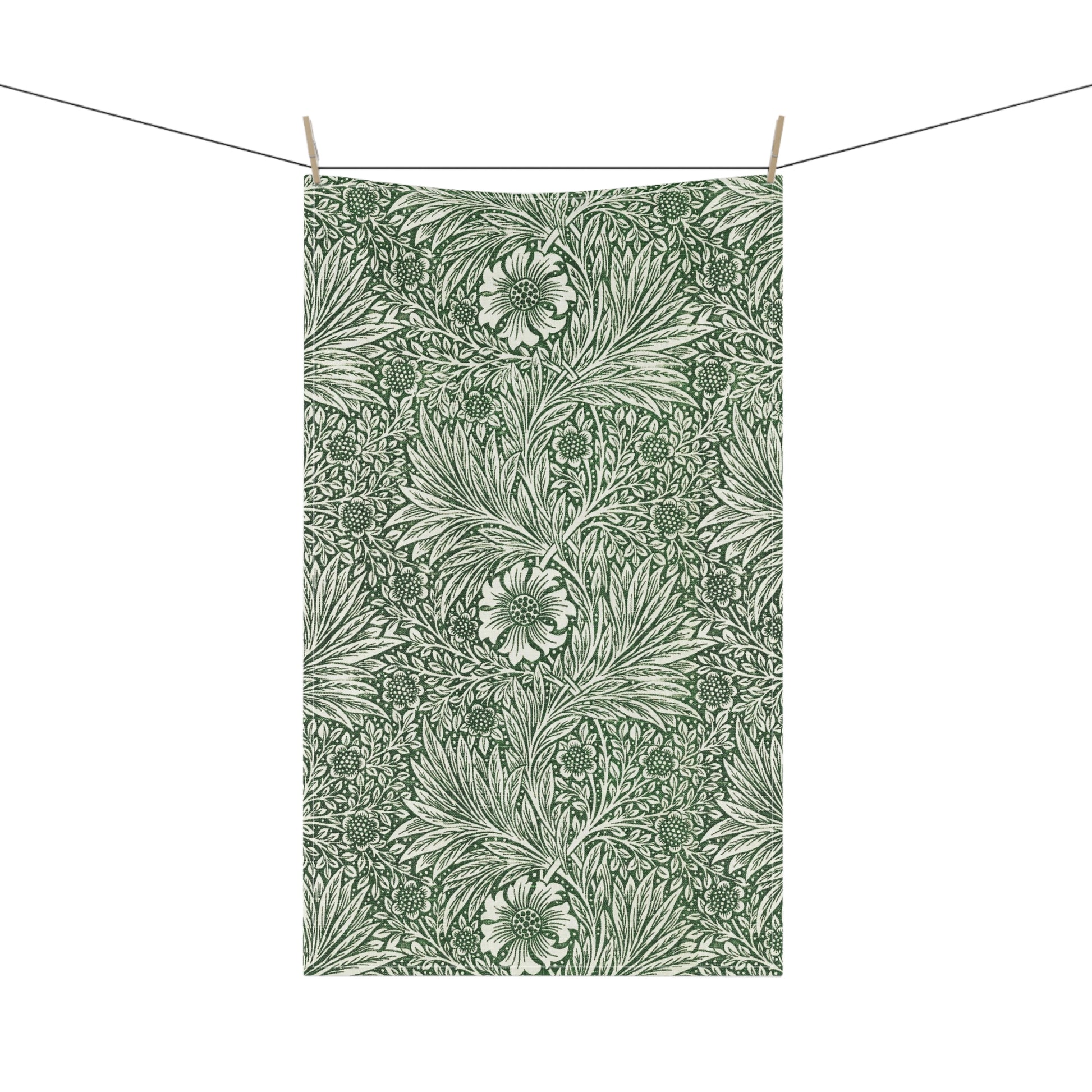 A kitchen tea towel with a green floral pattern inspired by William Morris & Co - Marigold Collection.