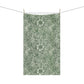 A kitchen tea towel with a green floral pattern inspired by William Morris & Co - Marigold Collection.