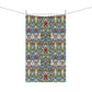 A kitchen tea towel with a floral and geometric pattern inspired by William Morris - Snakeshead Collection.