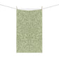 A green kitchen tea towel with a floral and leaf pattern inspired by William Morris & Co - Acorn and Oak Leaves Collection.