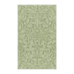 A green kitchen tea towel with a floral and leaf pattern inspired by William Morris & Co - Acorn and Oak Leaves Collection.