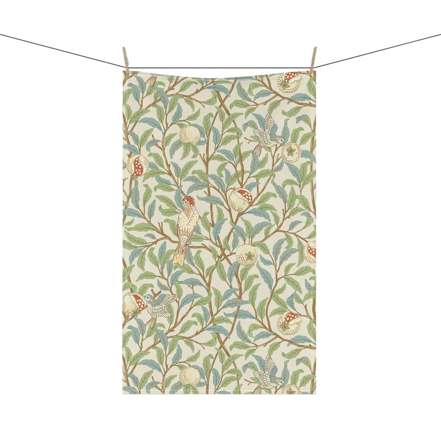A kitchen tea towel with a floral and bird design, inspired by the William Morris - Bird and Pomegranate Collection in a parchment colour.