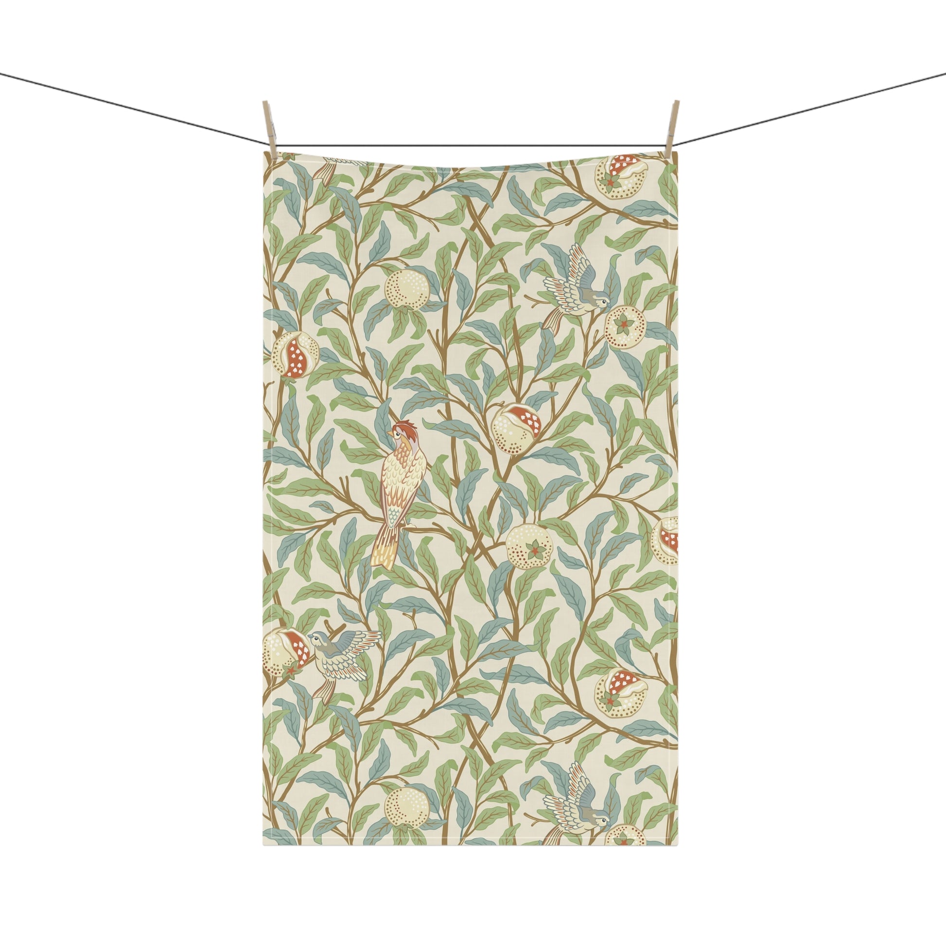 A kitchen tea towel with a floral and bird design, inspired by the William Morris - Bird and Pomegranate Collection in a parchment colour.