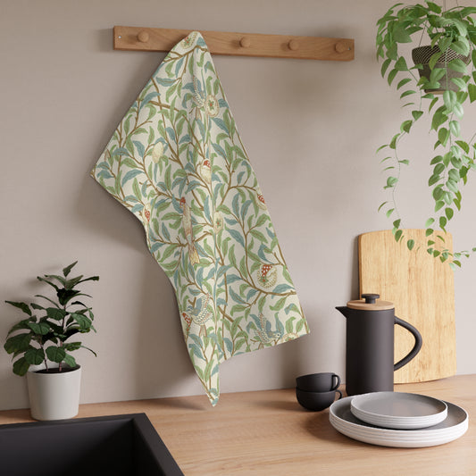 A kitchen tea towel with a floral and bird design, inspired by the William Morris - Bird and Pomegranate Collection in a parchment colour.