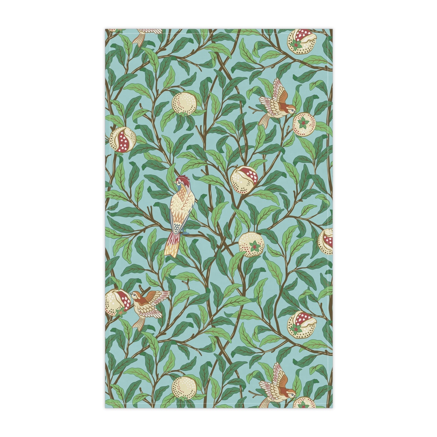 A kitchen tea towel with a blue background featuring bird and pomegranate patterns inspired by William Morris.