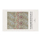 Decorative tea towel with floral pattern and 'William Morris & Co' branding on a white background