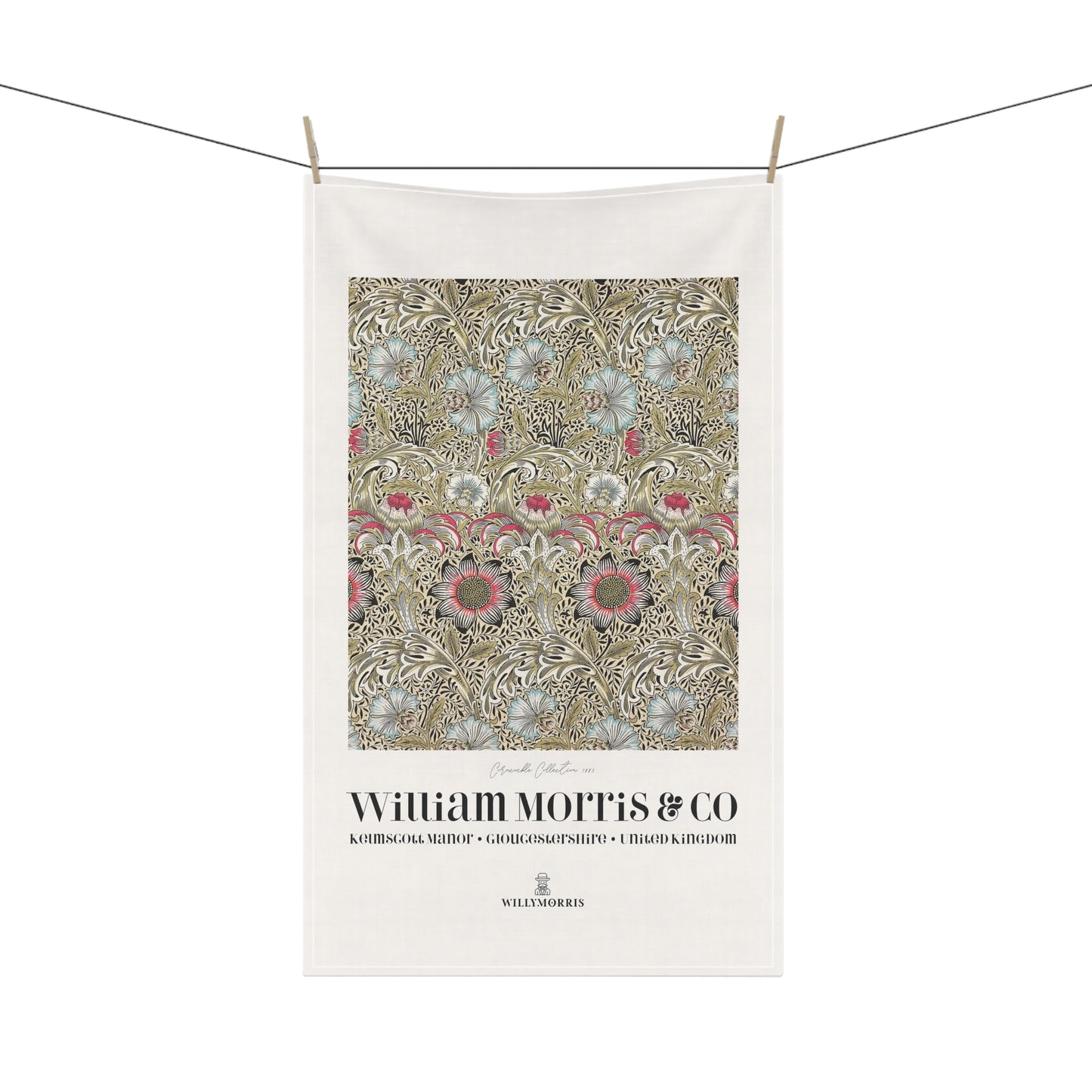 Decorative towel with floral pattern and 'William Morris & Co' branding on a white background