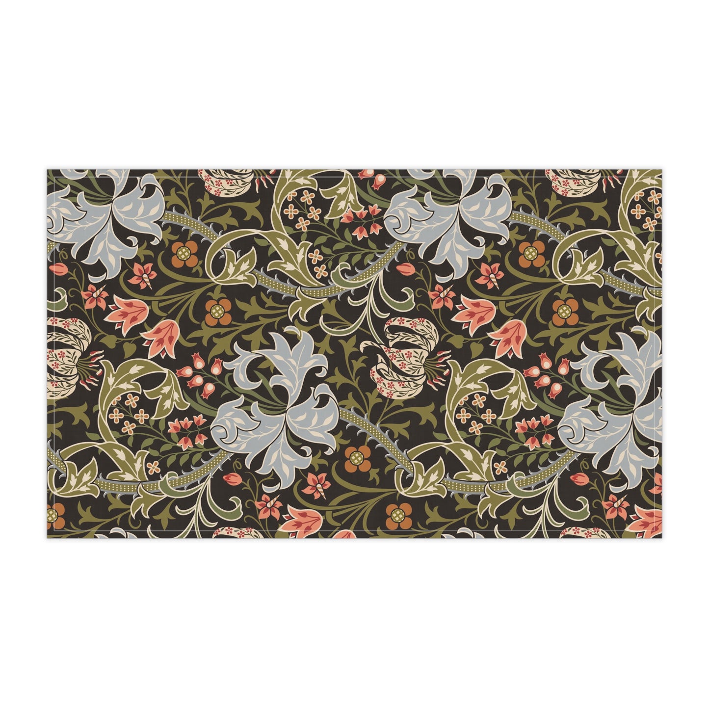 A rectangular tea towel with an intricate floral and scroll pattern on a dark background, shown against a plain white backdrop.
