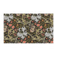 A rectangular tea towel with an intricate floral and scroll pattern on a dark background, shown against a plain white backdrop.