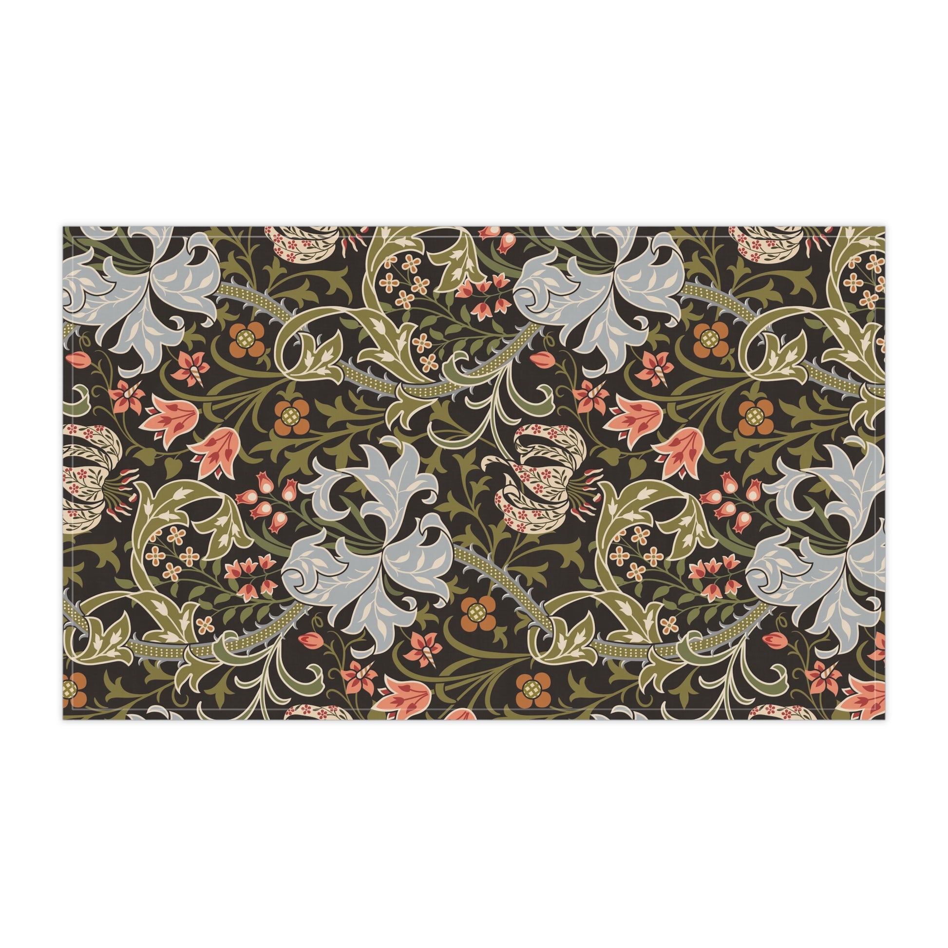 A rectangular tea towel with an intricate floral and scroll pattern on a dark background, shown against a plain white backdrop.