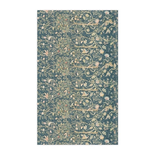 A rectangular kitchen tea towel with a floral and bird pattern in a teal colour inspired by William Morris & Co.