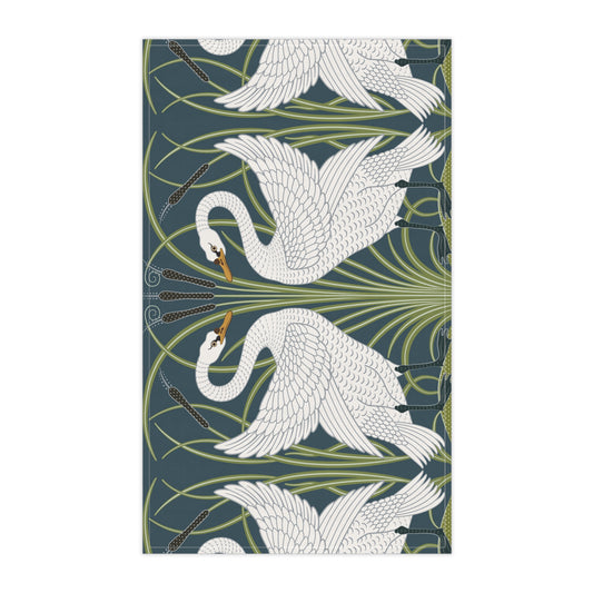 A kitchen tea towel featuring a repeated pattern of a white swan with a green and brownish background, and a set of dishes with cutlery on the side.