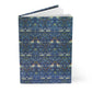 Notebook with a blue floral and bird pattern on a white background