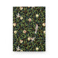 Notebook with William Morris & Co decorative cover featuring birds and foliage on a white background