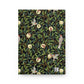 Notebook with a William Morris & Co decorative cover featuring birds and foliage on a black background