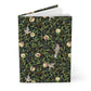 Notebook with a William Morris & Co decorative cover featuring birds and foliage on a white background