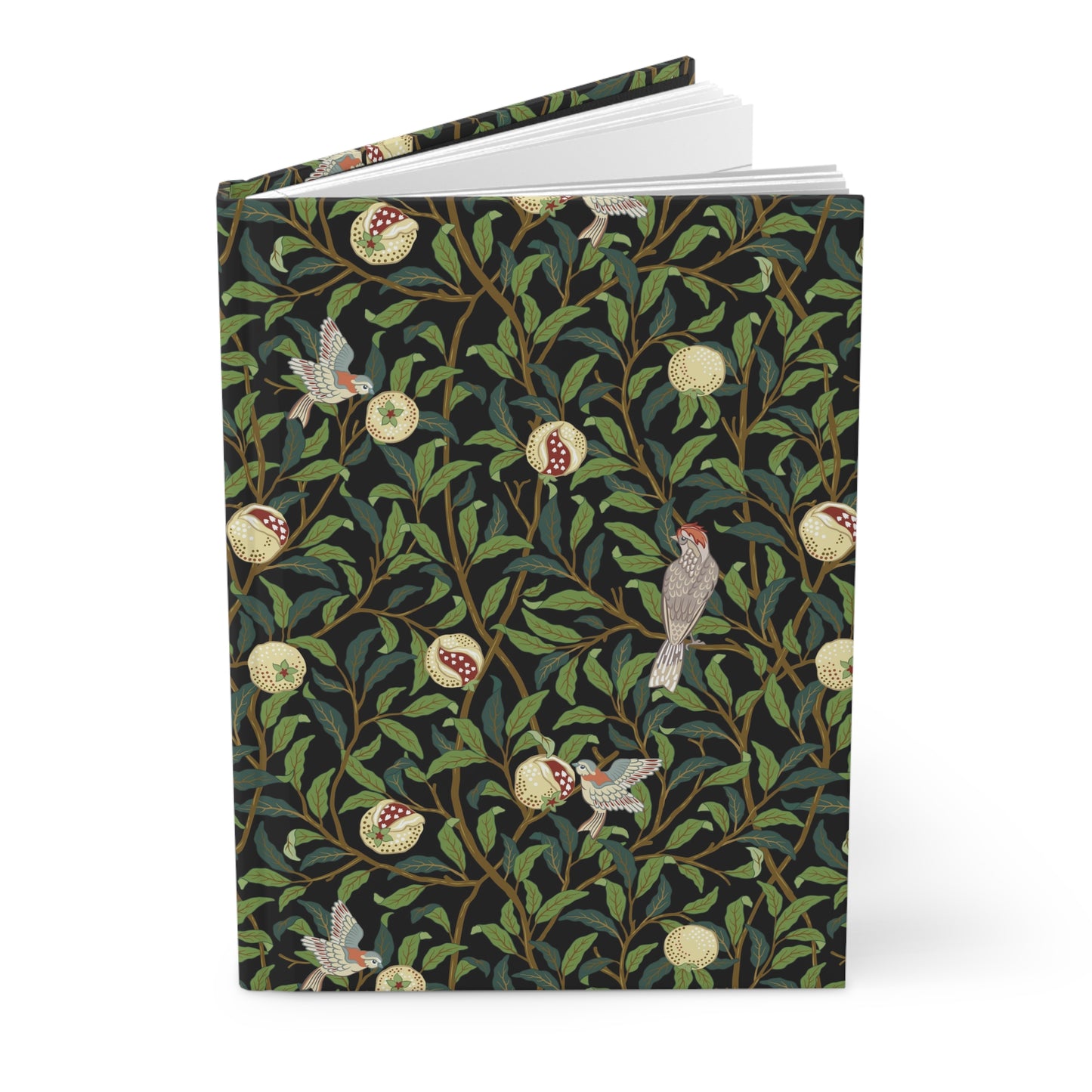 Notebook with a William Morris & Co decorative cover featuring birds and foliage on a white background