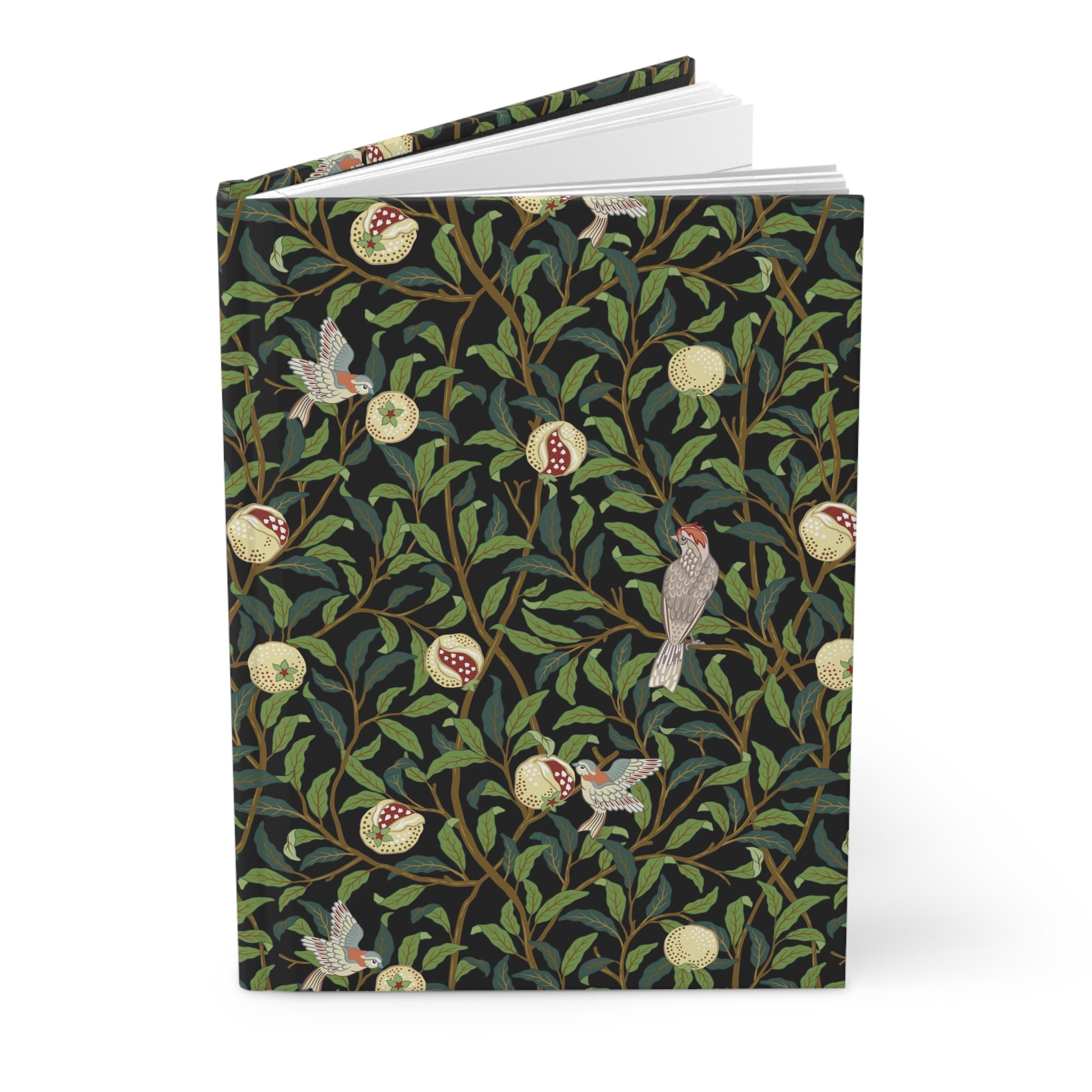 Notebook with a William Morris & Co decorative cover featuring birds and foliage on a white background
