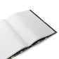 Open notebook with lined pages on a white background