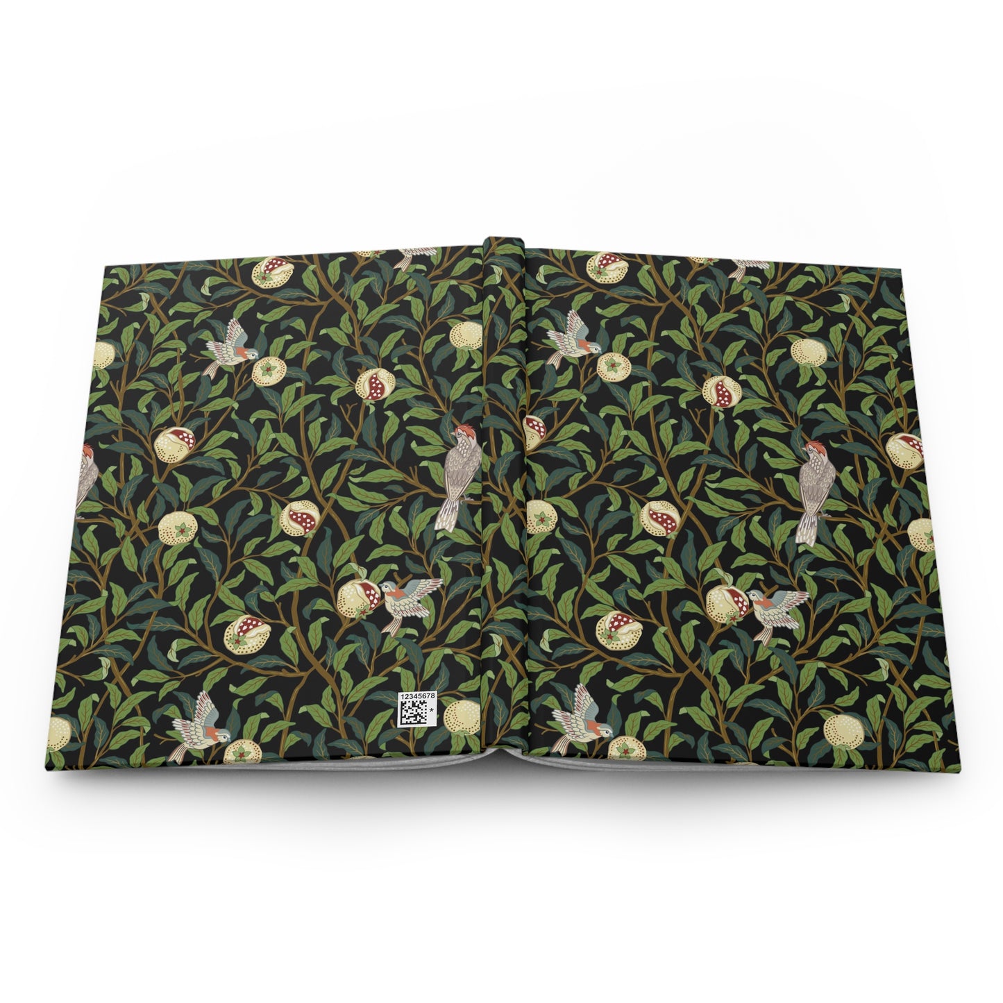 William Morris & Co patterned notebook with a nature design on a white background