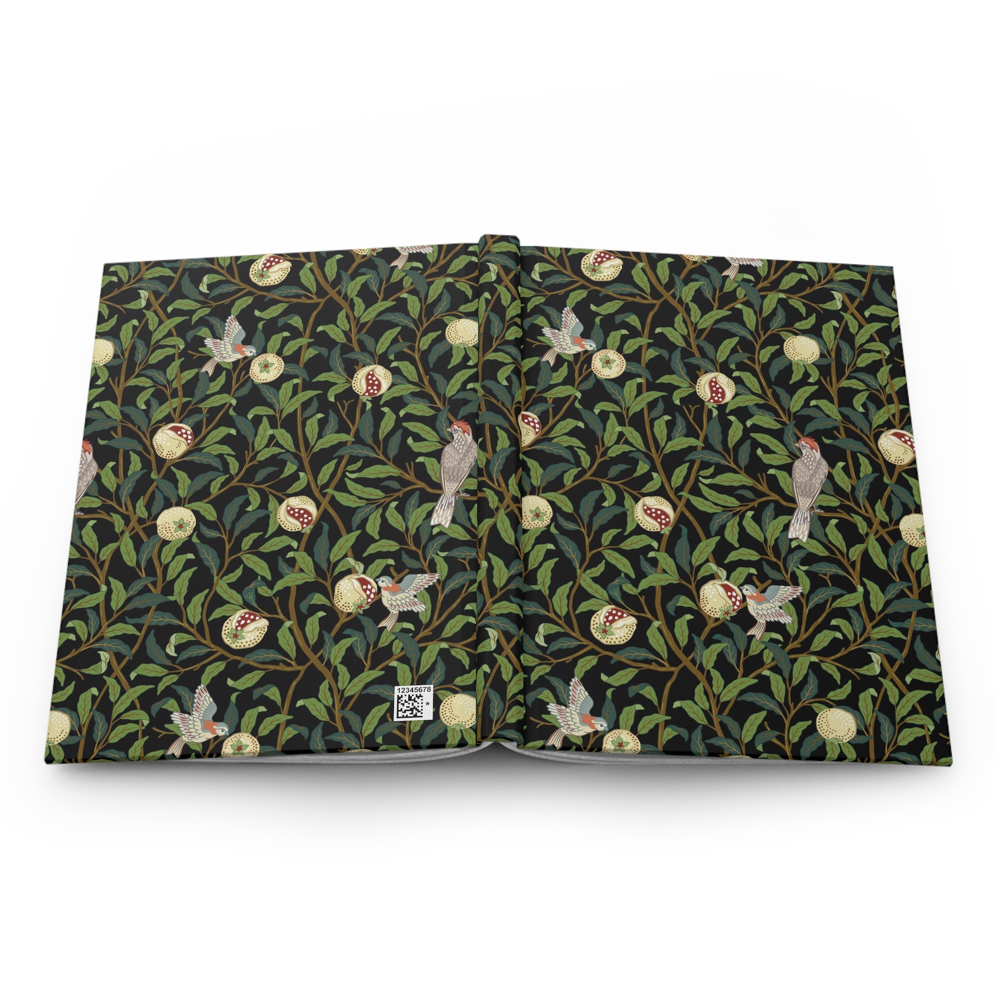 William Morris & Co patterned notebook with a nature design on a white background