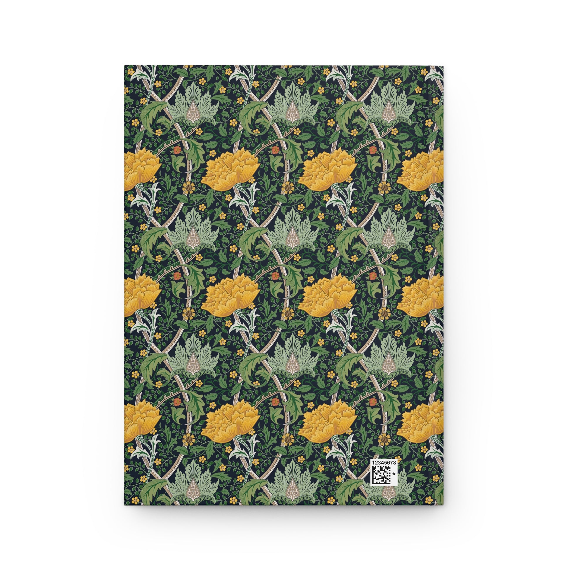 Notebook with a floral pattern featuring yellow flowers and green leaves on a dark green background.