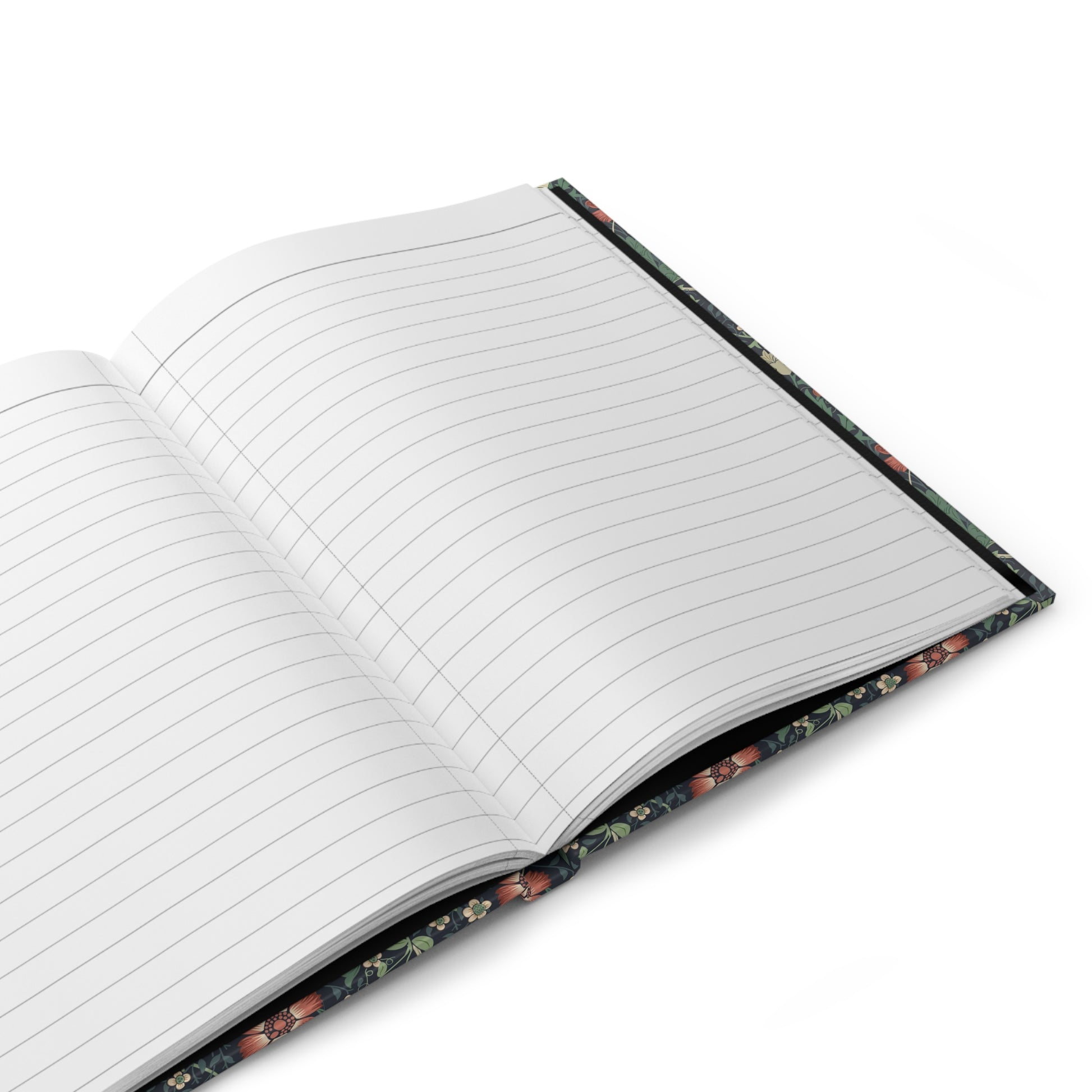 Open notebook with floral design on the cover on a white background