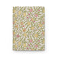Notebook with floral and fruit pattern on a white background