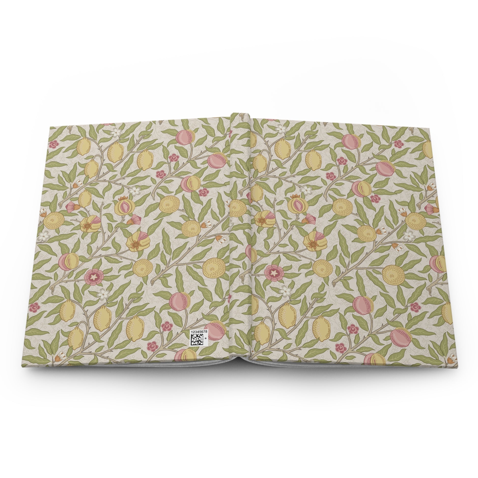 Floral patterned notebook with lemons and leaves on a white background