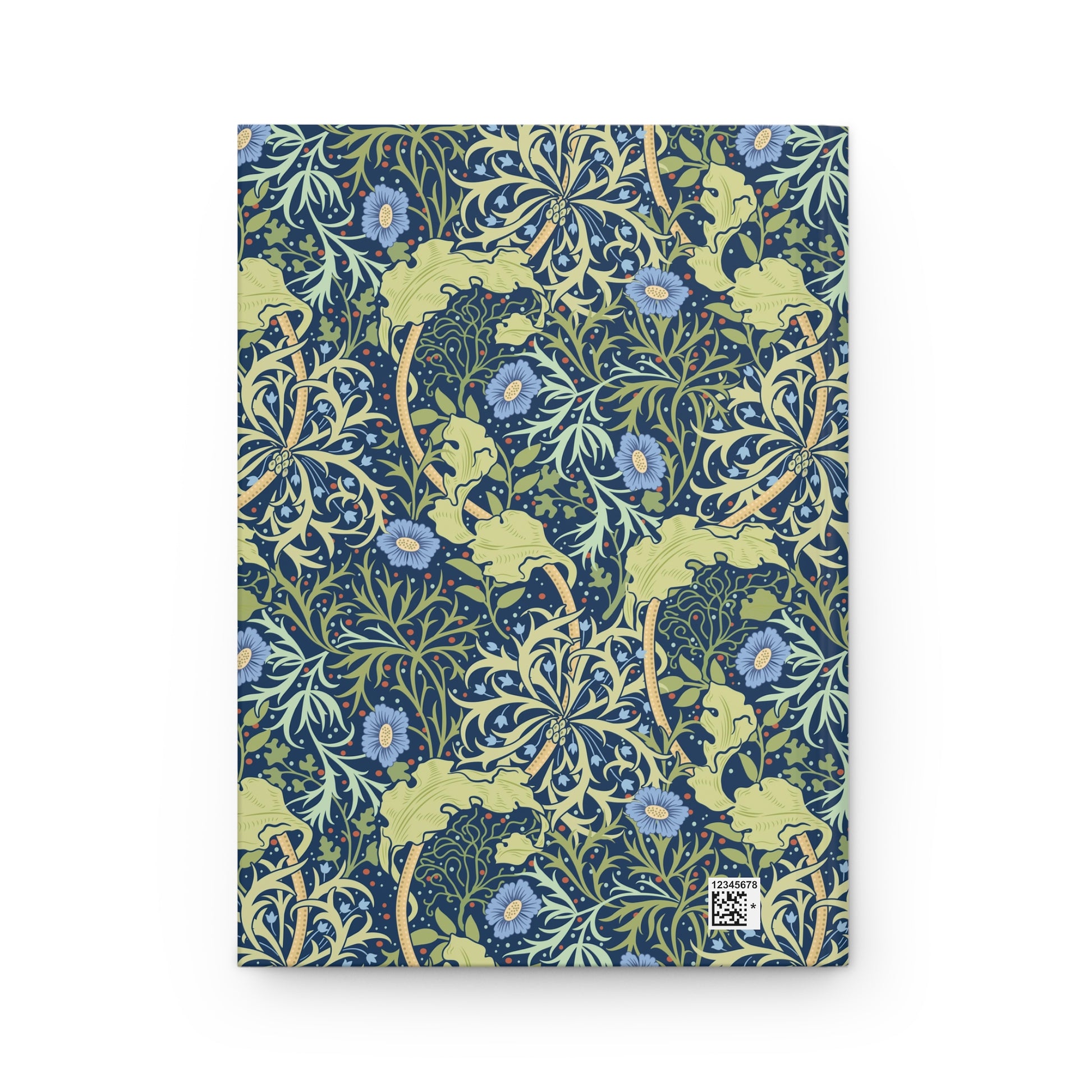Notebook with William Morris & Co floral pattern on a white background