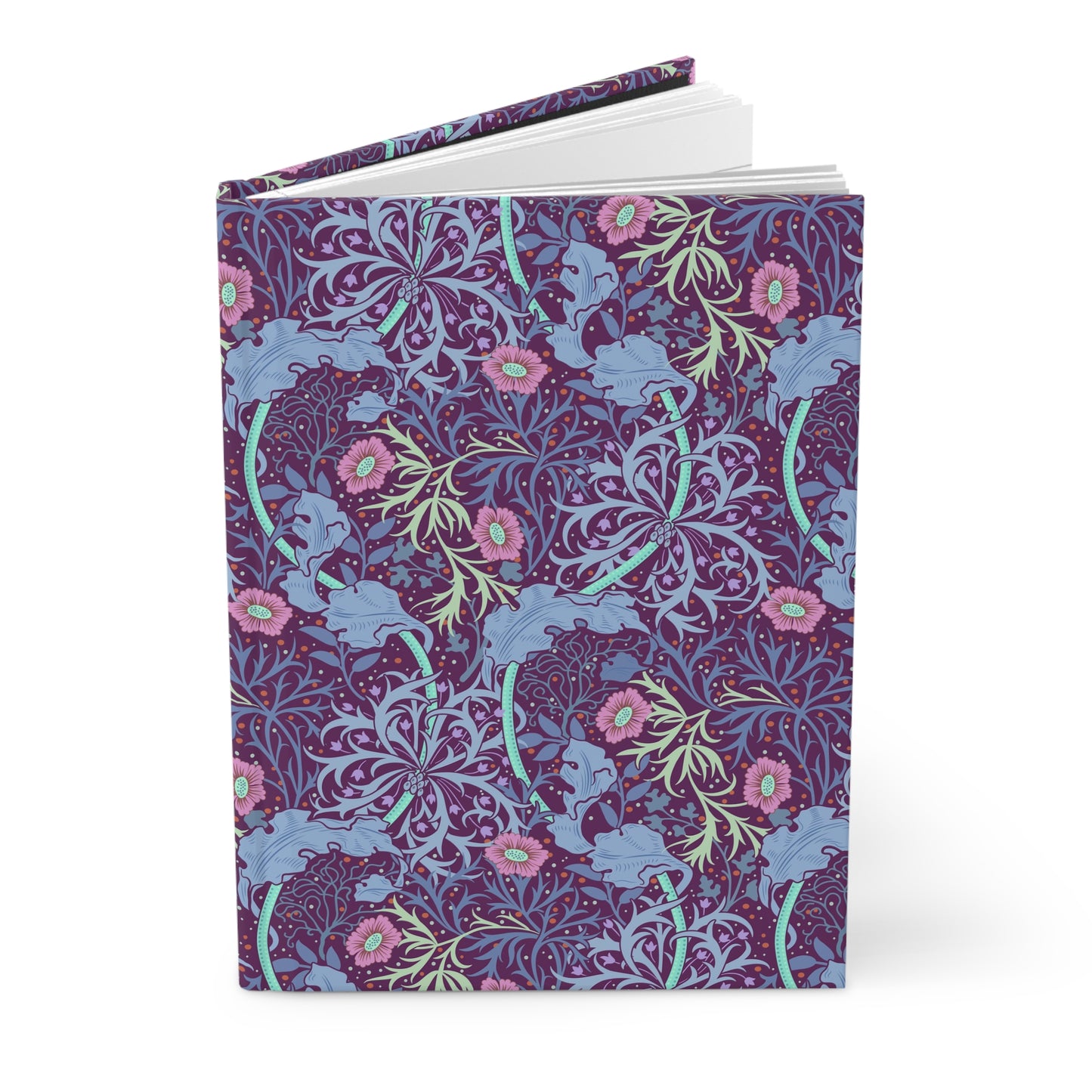 Notebook with a colourful William Morris & Co floral and dragon design on a white background