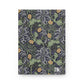 Notebook with William Morris & Co floral pattern on a white background