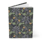 Notebook with a decorative cover featuring William Morris Co floral and dragon design on a white background