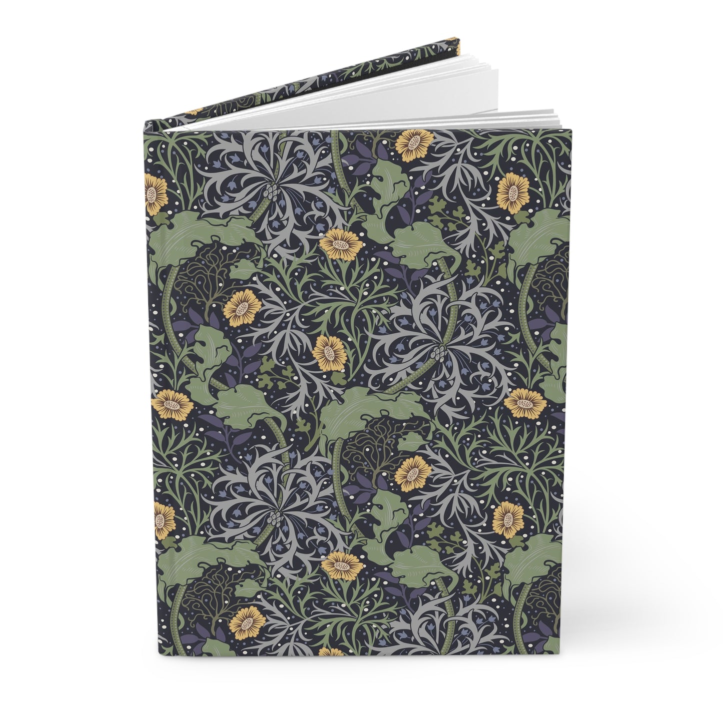 Notebook with a decorative cover featuring William Morris Co floral and dragon design on a white background