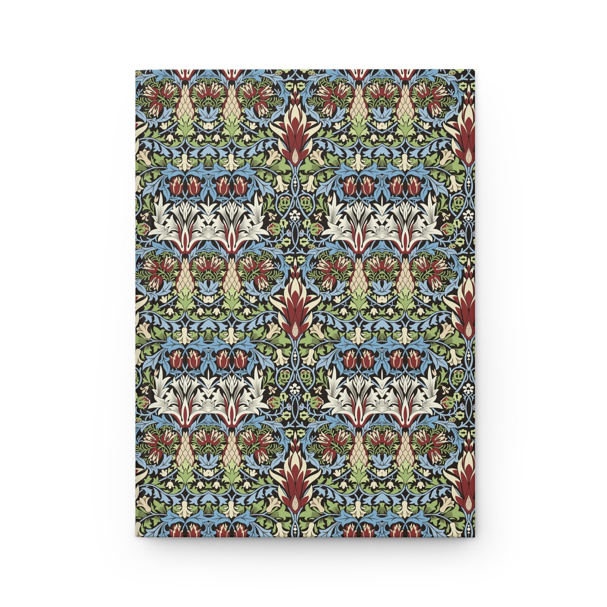 A rectangular notebook or journal with a dense, symmetrical Art Nouveau pattern featuring blue, green, red, and cream motifs, shown against a plain white background.