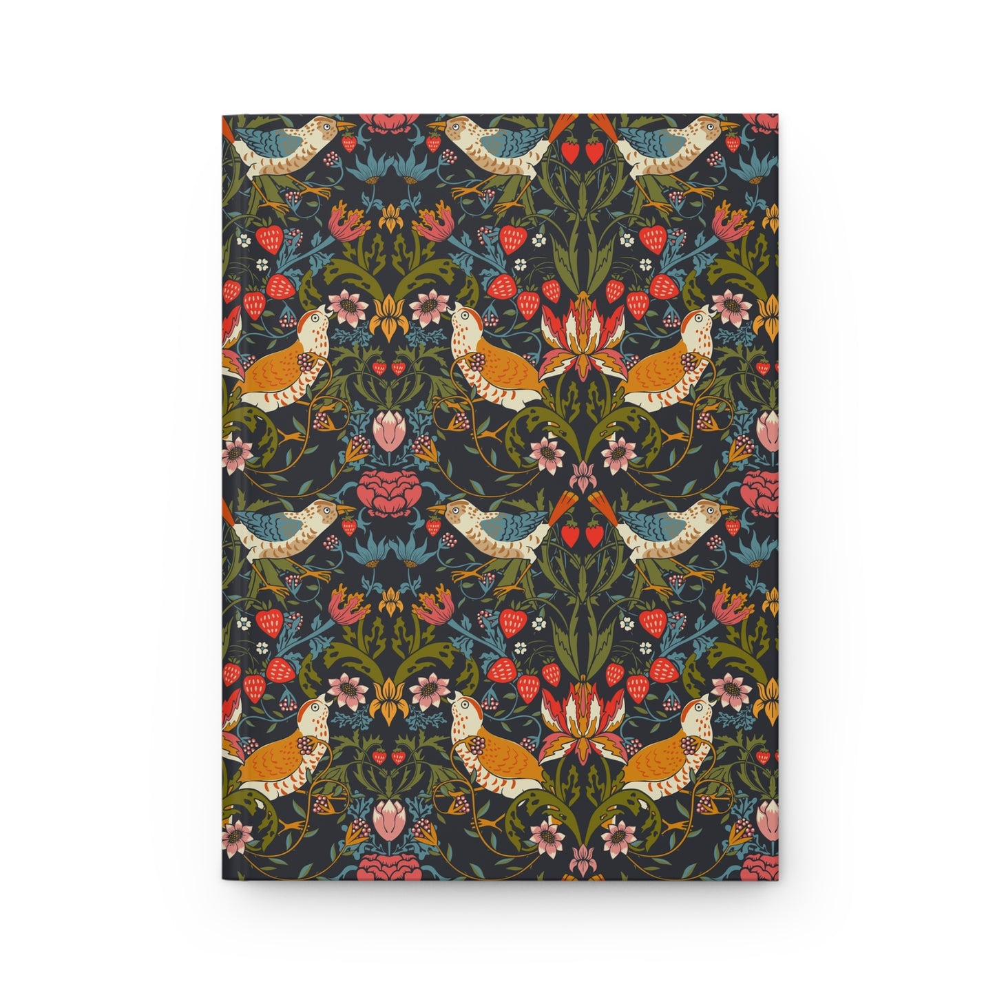 Notebook with a colorful floral and bird pattern on a white background