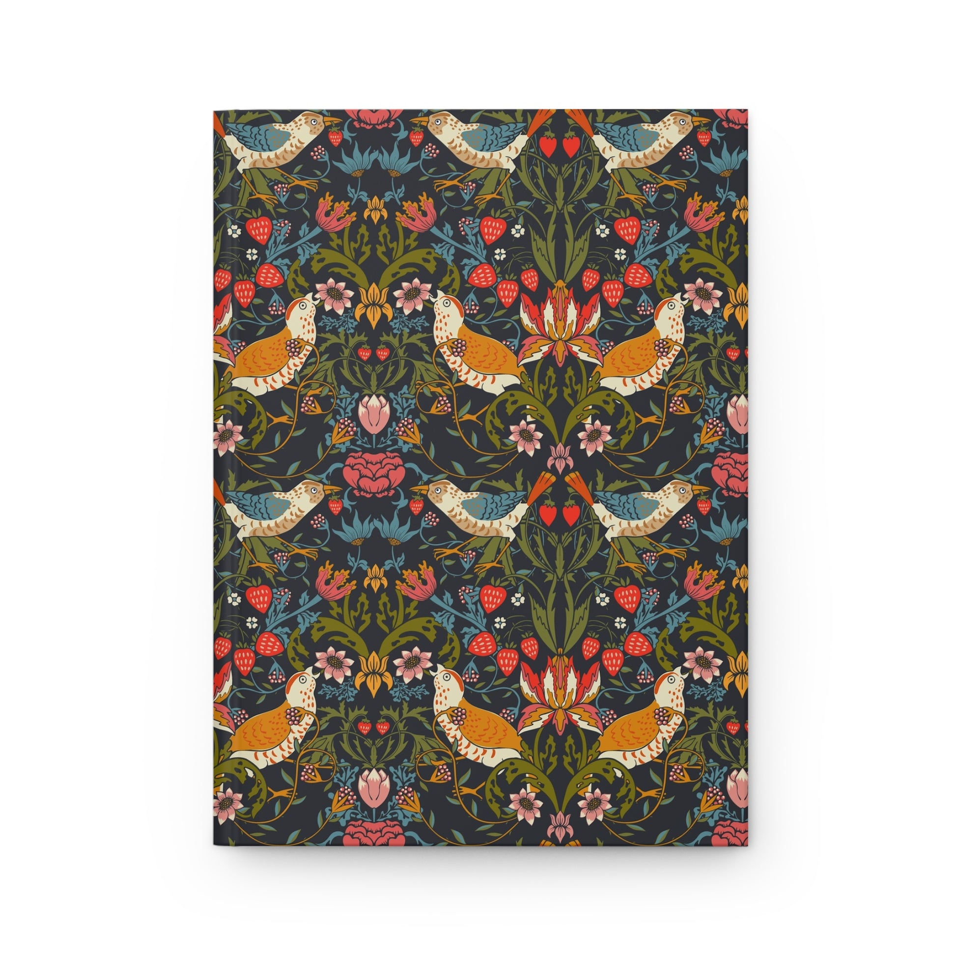 Notebook with a colorful floral and bird pattern on a white background