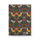 Notebook with a colorful floral and bird pattern on a white background