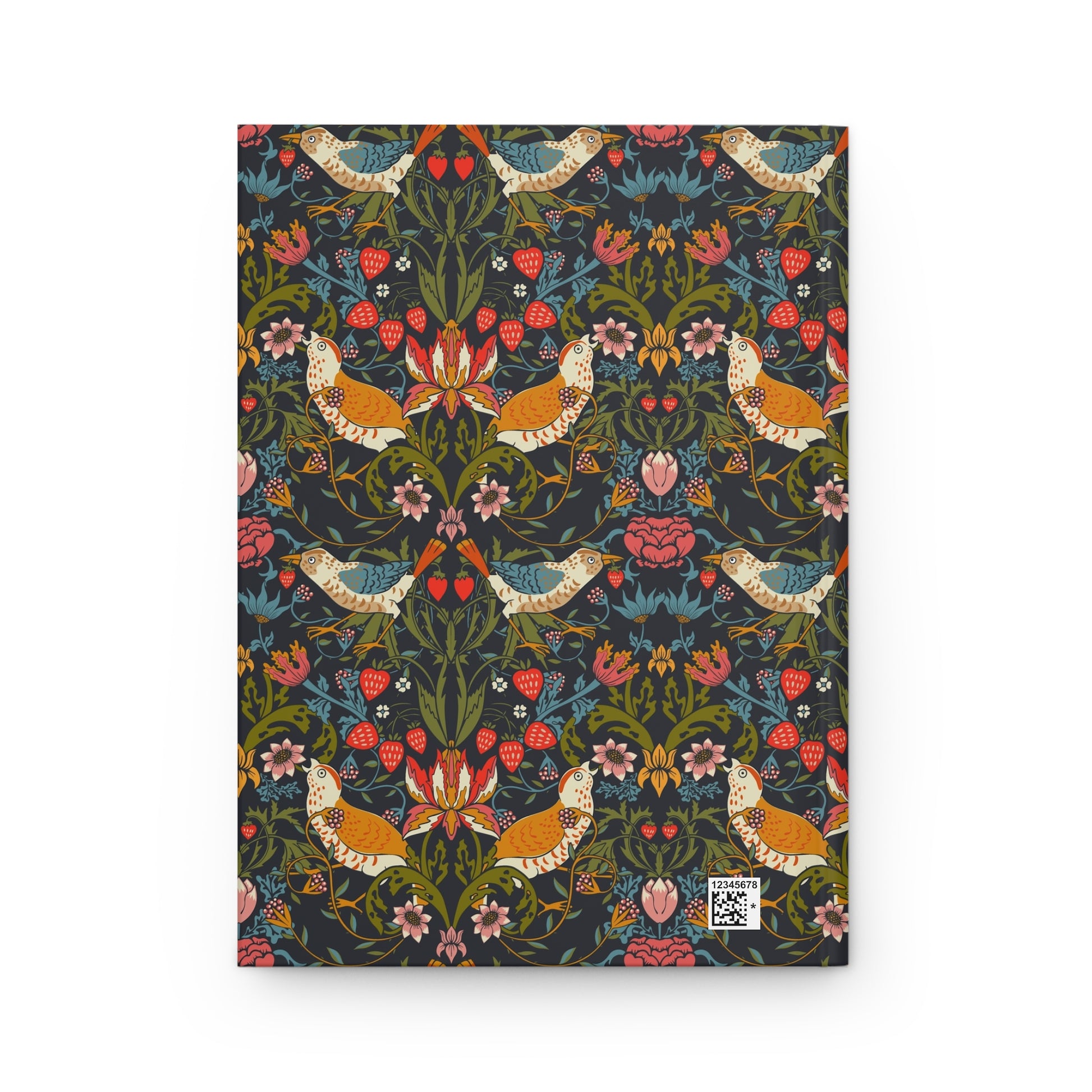 Notebook with a colorful floral and bird pattern on a white background