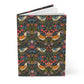Notebook with a colorful floral and bird pattern on a white background