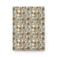 Notebook with William Morris & Co floral and butterfly pattern on beige background