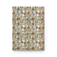 Notebook with William Morris & Co floral and butterfly pattern on beige background