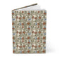 Notebook with William Morris & Co floral and butterfly pattern on a white background