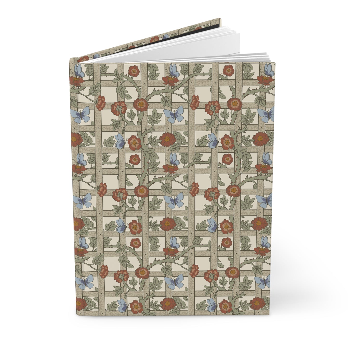 Notebook with William Morris & Co floral and butterfly pattern on a white background