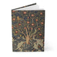 Notebook with a decorative cover featuring birds and trees on a white background