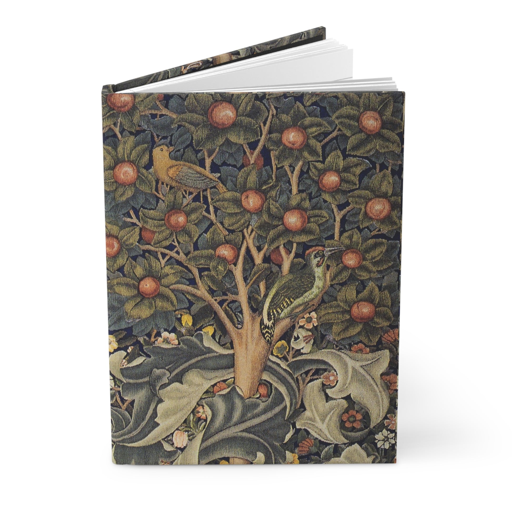 Notebook with a decorative cover featuring birds and trees on a white background
