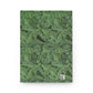 Notebook with green leaf pattern on a white background
